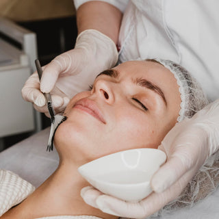 Young woman receiving face skin treatment at Leor Clinic